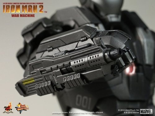 Illustration for article titled How Does War Machine's Gun Work? Can He Sit Down? New Toy Pics Reveal All!